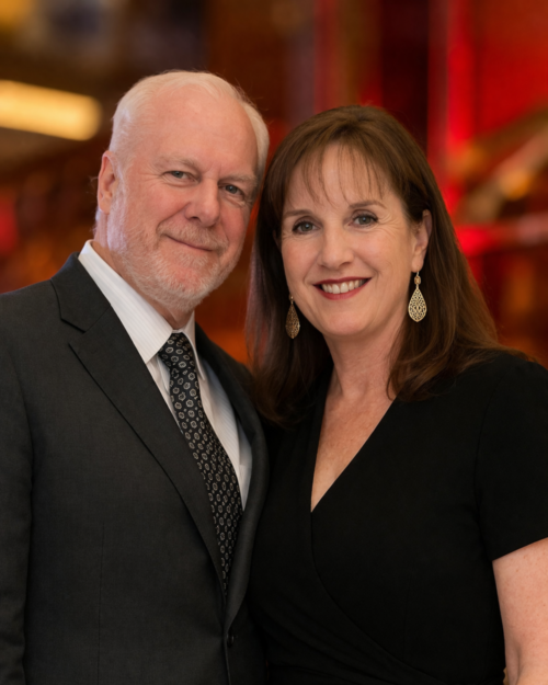 Tom and Cindy Weathers Tom and Cindy Weathers in formal attire, standing together in a close portrait on the Weathers.us homepage.